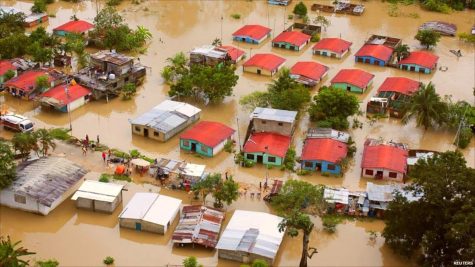 Citizens of Venezuela deal with the effects of floods all throughout the country