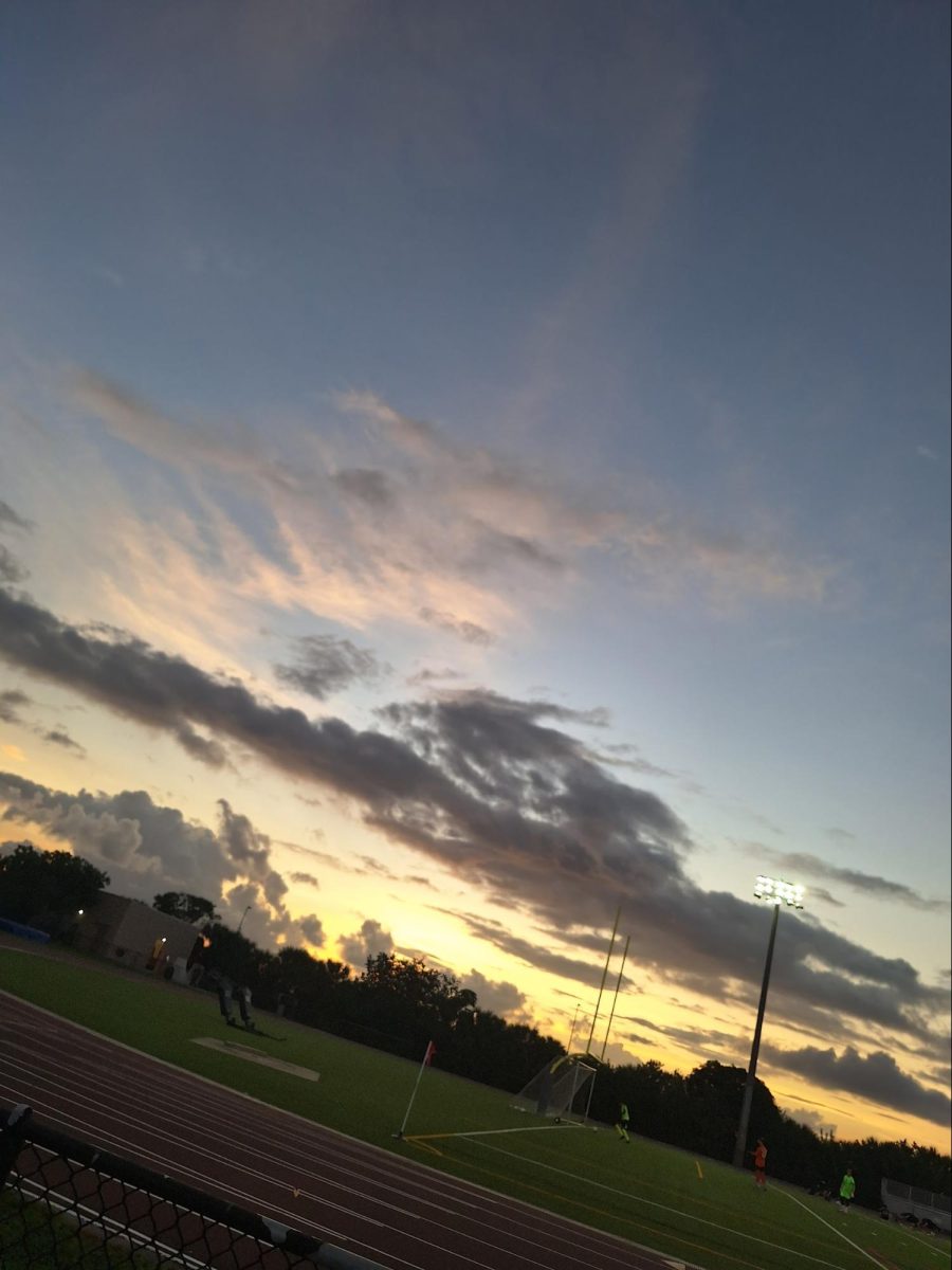 Anne Butterfield Photo of: sunset at coral glades track field