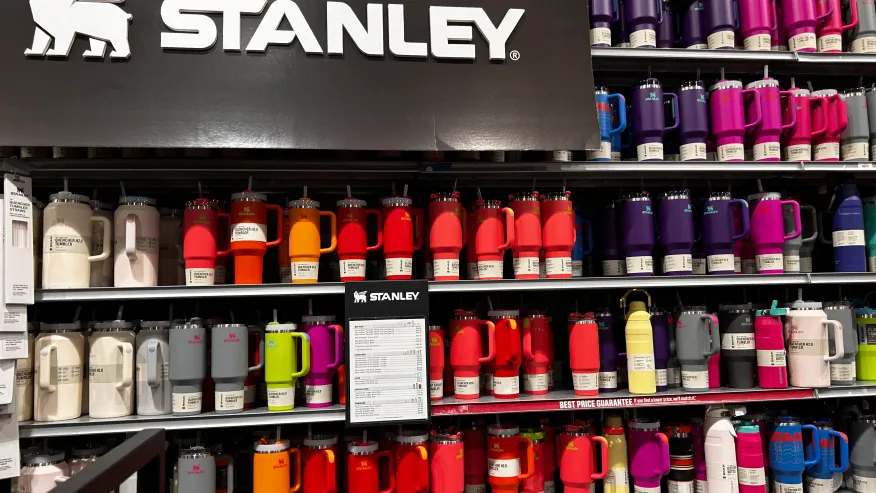 Credit: Trendy Stanley brand water bottle tumbler display in Dick’s Sporting Goods store, Queens, New York. (Photo by: Lindsey Nicholson/UCG/Universal Images Group via Getty Images)