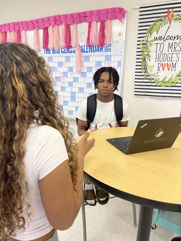 Malia (10) and Khameron (12) getting into an "argument".